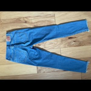 Levi’s Ripped Jeans With Frayed bottoms